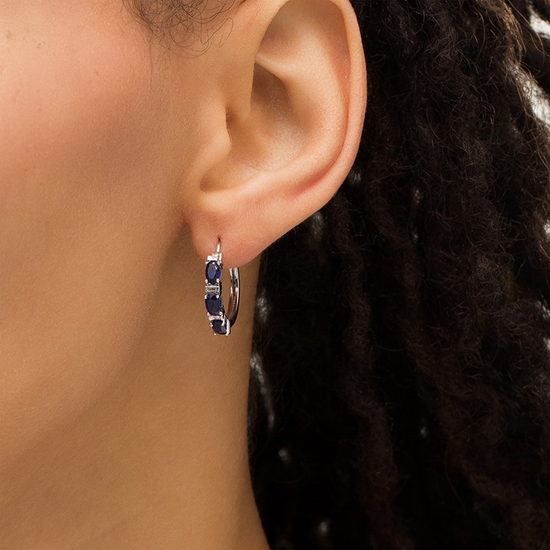 Oval Lab-Created Blue Sapphire and Baguette Diamond Accent Three Stone Hoop Earrings in Sterling Silver