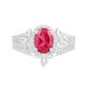 Oval Lab-Created Ruby and 0.065 CT. T.W. Diamond Bead Frame Flower-Sides Split Shank Bridal Set in Sterling Silver