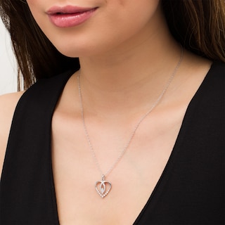 0.33 CT. T.W. Diamond Heart Pendant in 10K White Gold