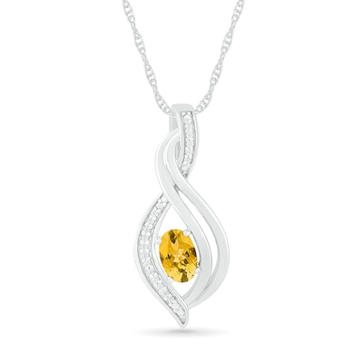 Oval Citrine and 0.04 CT. T.W. Diamond Flame Drop Pendant in Sterling Silver