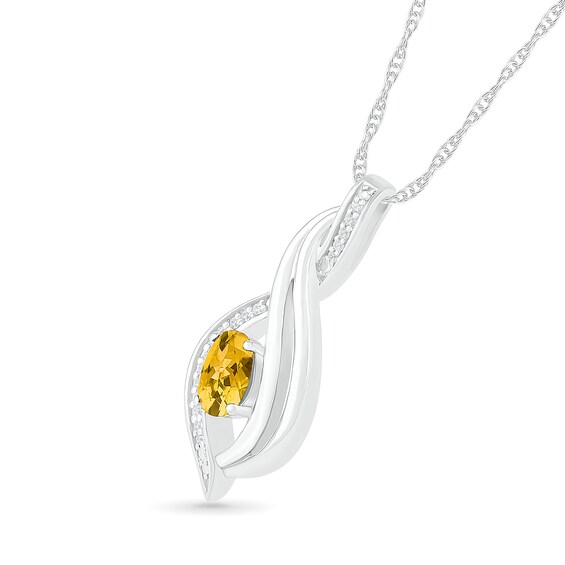 Oval Citrine and 0.04 CT. T.W. Diamond Flame Drop Pendant in Sterling Silver