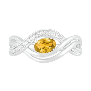 Sideways Oval Citrine and 0.067 CT. T.W. Diamond Multi-Row Bypass Split Shank Ring in Sterling Silver