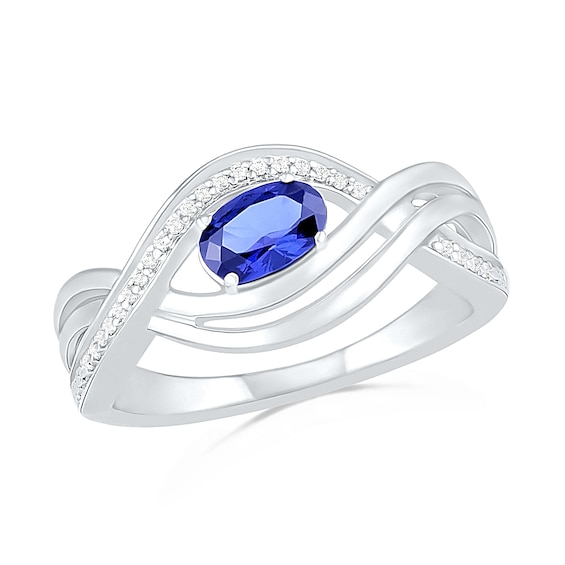 Sideways Oval Blue Lab-Created Sapphire and 0.067 CT. T.W. Diamond Multi-Row Bypass Split Shank Ring in Sterling Silver