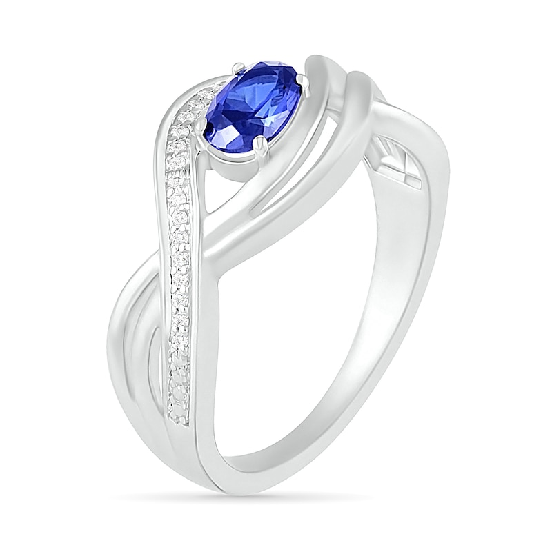 Sideways Oval Blue Lab-Created Sapphire and 0.067 CT. T.W. Diamond Multi-Row Bypass Split Shank Ring in Sterling Silver