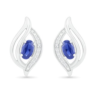 Oval Blue Lab-Created Sapphire and 0.04 CT. T.W. Diamond Bypass Flame Stud Earrings in Sterling Silver