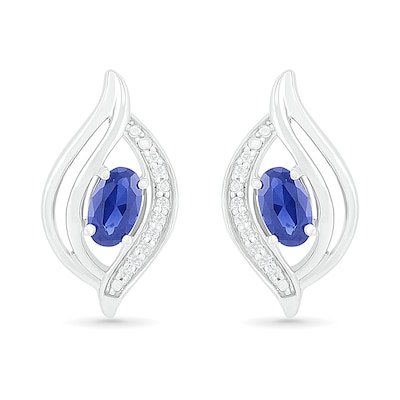 Oval Blue Lab-Created Sapphire and 0.04 CT. T.W. Diamond Bypass Flame Stud Earrings in Sterling Silver