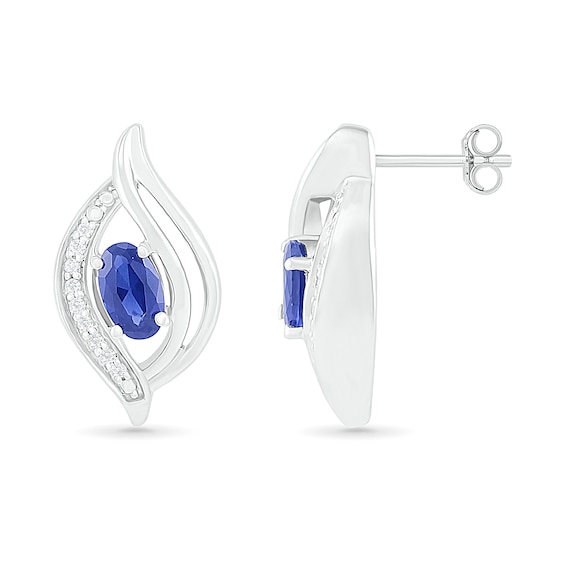 Oval Blue Lab-Created Sapphire and 0.04 CT. T.W. Diamond Bypass Flame Stud Earrings in Sterling Silver