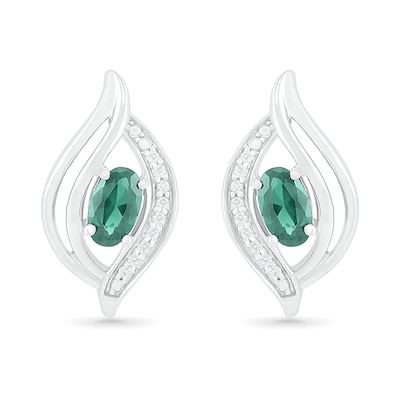 Oval Lab-Created Emerald and 0.04 CT. T.W. Diamond Bypass Flame Stud Earrings in Sterling Silver