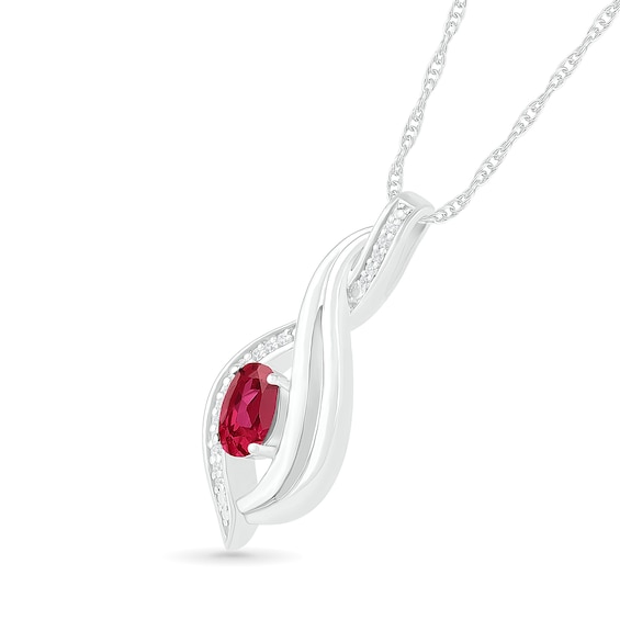 Oval Lab-Created Ruby and 0.04 CT. T.W. Diamond Flame Drop Pendant in Sterling Silver