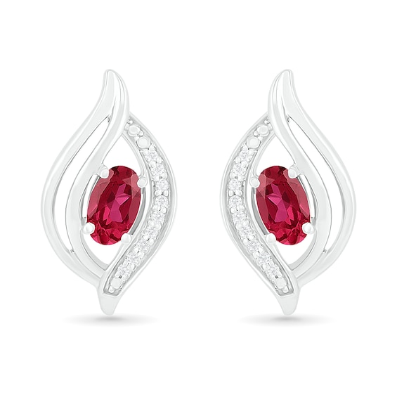 Oval Lab-Created Ruby and 0.04 CT. T.W. Diamond Bypass Flame Stud Earrings in Sterling Silver