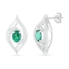 Thumbnail Image 1 of Lab-Created Oval Emerald and 0.067 CT. T.W. Diamond Bypass Flame Stud Earrings in Sterling Silver