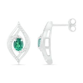 Lab-Created Oval Emerald and 0.067 CT. T.W. Diamond Bypass Flame Stud Earrings in Sterling Silver