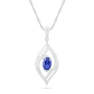 Oval Blue Lab-Created Sapphire and 0.065 CT. T.W. Diamond Bypass Flame Pendant in Sterling Silver