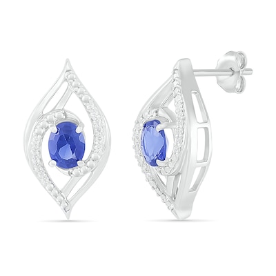 Oval Blue Lab-Created Sapphire and 0.067 CT. T.W. Diamond Bypass Flame Stud Earrings in Sterling Silver