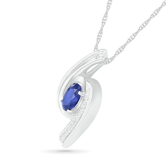 Oval Blue Lab-Created Sapphire and Diamond Accent Bypass Ribbon Pendant in Sterling Silver