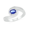 Thumbnail Image 0 of Sideways Blue Lab-Created Sapphire and Diamond Accent Bypass Ring in Sterling Silver