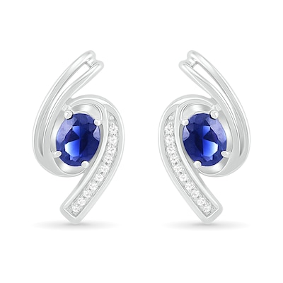 Oval Blue Lab-Created Sapphire and 0.04 CT. T.W. Diamond Bypass Ribbon Stud Earrings in Sterling Silver