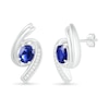 Thumbnail Image 2 of Oval Blue Lab-Created Sapphire and 0.04 CT. T.W. Diamond Bypass Ribbon Stud Earrings in Sterling Silver