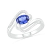 Sideways Blue Lab-Created Sapphire and 0.068 CT. T.W. Diamond Ribbon Bypass Ring in Sterling Silver