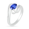 Sideways Blue Lab-Created Sapphire and 0.068 CT. T.W. Diamond Ribbon Bypass Ring in Sterling Silver