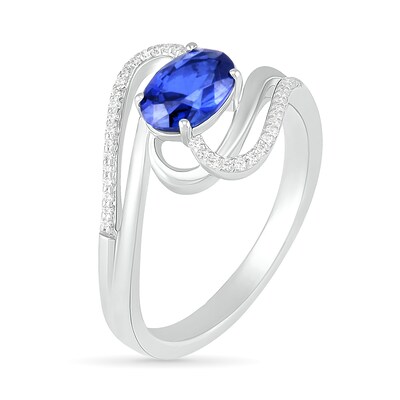 Sideways Blue Lab-Created Sapphire and 0.068 CT. T.W. Diamond Ribbon Bypass Ring in Sterling Silver