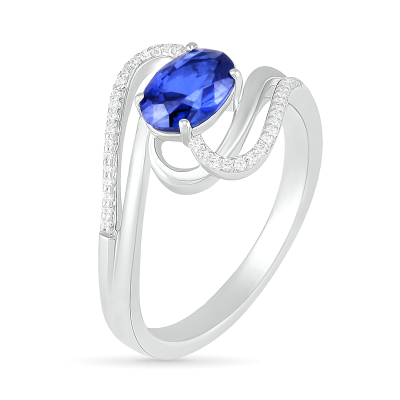 Sideways Blue Lab-Created Sapphire and 0.068 CT. T.W. Diamond Ribbon Bypass Ring in Sterling Silver|Peoples Jewellers