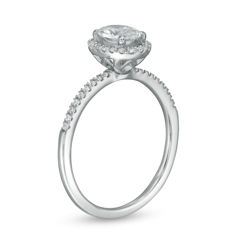 0.88 CT. T.W. Oval Diamond Frame Engagement Ring in 14K White Gold