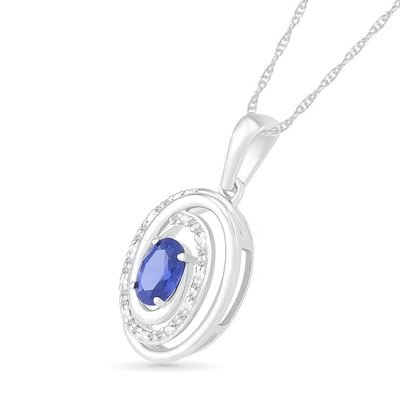 Oval Lab-Created Sapphire and 0.065 CT. T.W. Diamond Beaded Open Swirl Frame Drop Pendant in Sterling Silver