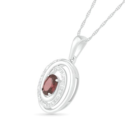 Oval Garnet and 0.065 CT. T.W. Diamond Beaded Open Swirl Frame Drop Pendant in Sterling Silver