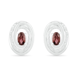 Oval Garnet and 0.066 CT. T.W. Diamond Beaded Open Swirl Frame Stud Earrings in Sterling Silver