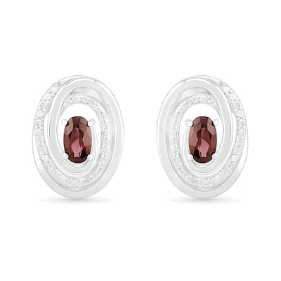 Oval Garnet and 0.066 CT. T.W. Diamond Beaded Open Swirl Frame Stud Earrings in Sterling Silver