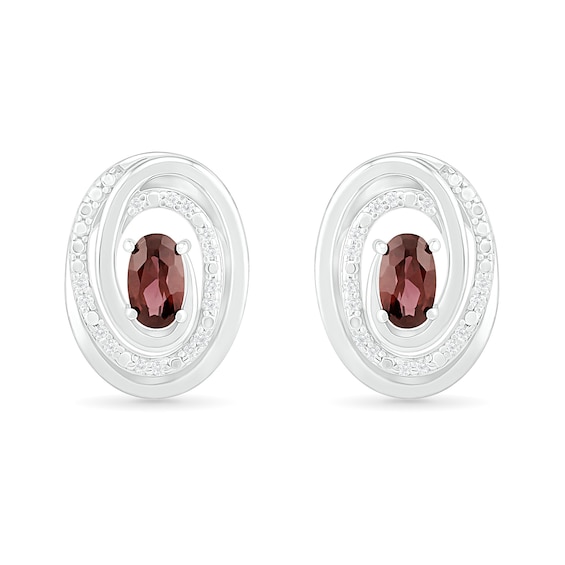 Oval Garnet and 0.066 CT. T.W. Diamond Beaded Open Swirl Frame Stud Earrings in Sterling Silver