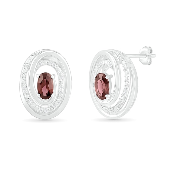 Oval Garnet and 0.066 CT. T.W. Diamond Beaded Open Swirl Frame Stud Earrings in Sterling Silver