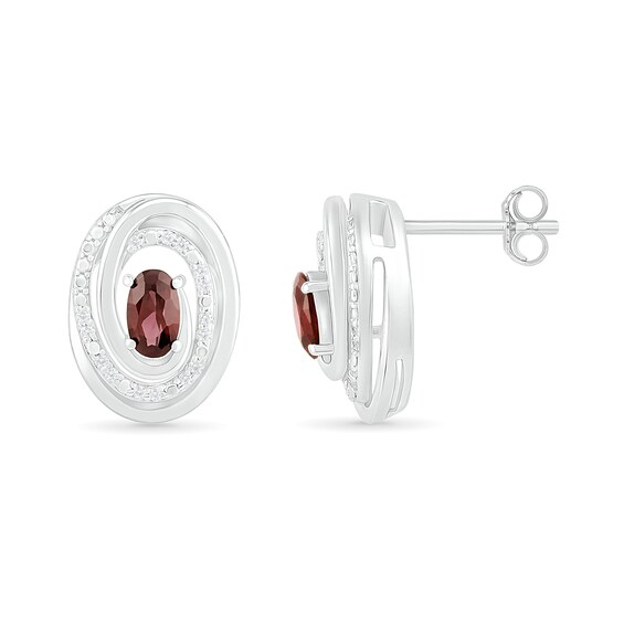 Oval Garnet and 0.066 CT. T.W. Diamond Beaded Open Swirl Frame Stud Earrings in Sterling Silver