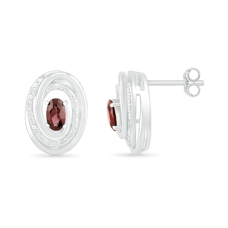 Oval Garnet and 0.066 CT. T.W. Diamond Beaded Open Swirl Frame Stud Earrings in Sterling Silver|Peoples Jewellers