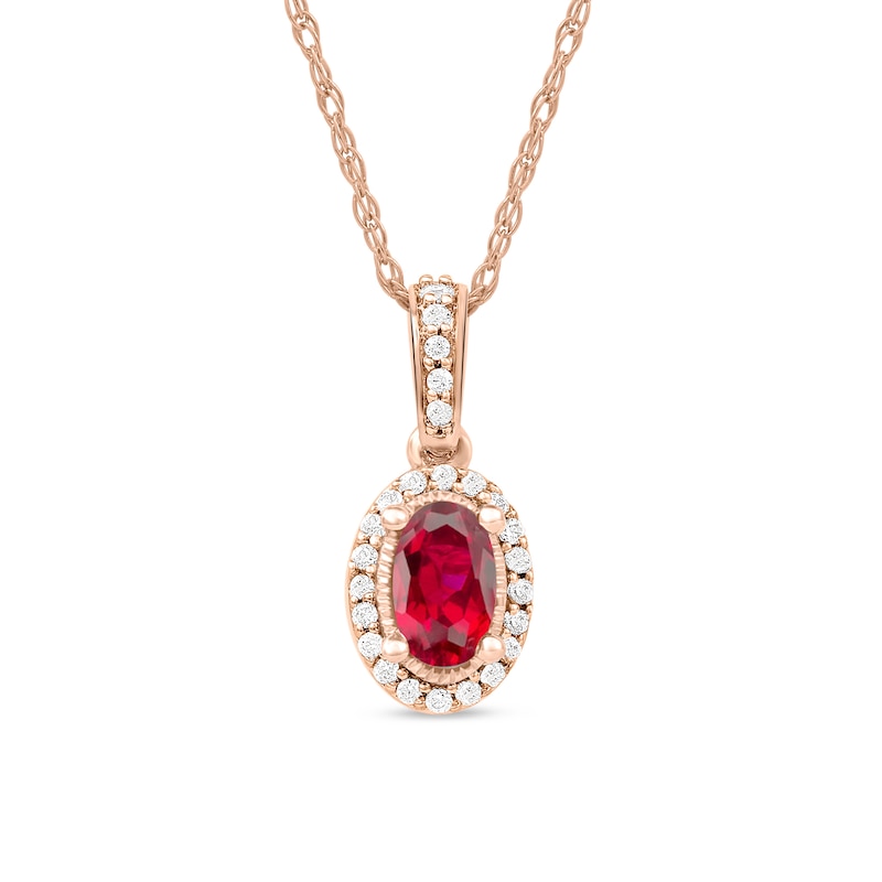 Oval Ruby and 0.06 CT. T.W. Diamond Framed Vintage-Style Drop Pendant in 10K Rose Gold|Peoples Jewellers