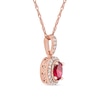 Oval Ruby and 0.06 CT. T.W. Diamond Framed Vintage-Style Drop Pendant in 10K Rose Gold