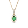 Oval Emerald and 0.06 CT. T.W. Diamond Framed Vintage-Style Drop Pendant in 10K Gold