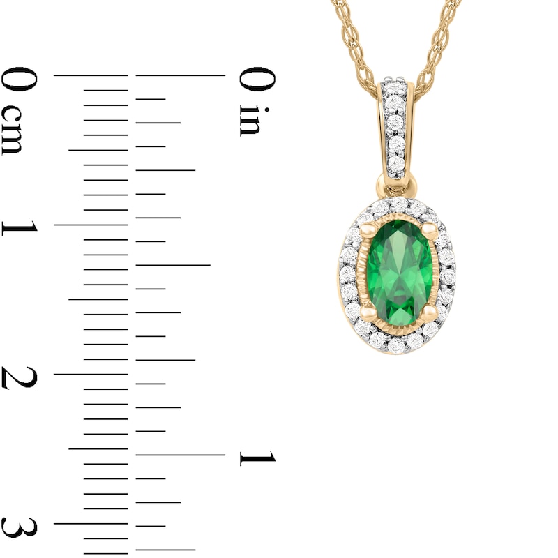 Oval Emerald and 0.06 CT. T.W. Diamond Framed Vintage-Style Drop Pendant in 10K Gold|Peoples Jewellers