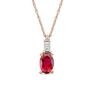 Oval Ruby and 0.05 CT. T.W. Baguette and Round Diamond Stacked Top Accent Pendant in 10K Rose Gold