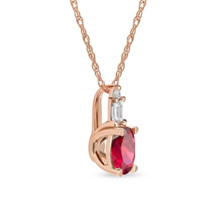 Oval Ruby and 0.05 CT. T.W. Baguette and Round Diamond Stacked Top Accent Pendant in 10K Rose Gold