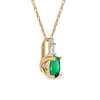 Thumbnail Image 1 of Oval Emerald and 0.05 CT. T.W. Baguette and Round Diamond Stacked Top Accent Pendant in 10K Gold