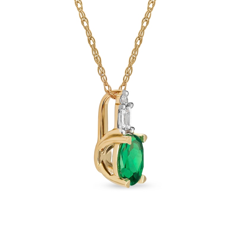 Oval Emerald and 0.05 CT. T.W. Baguette and Round Diamond Stacked Top Accent Pendant in 10K Gold|Peoples Jewellers