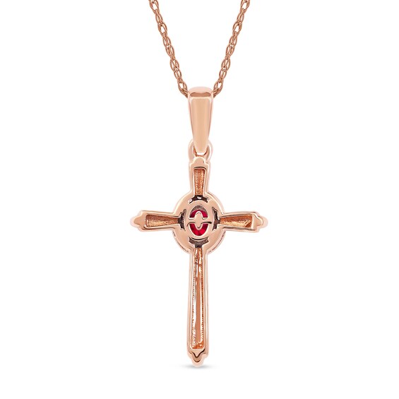 Oval Ruby and 0.04 CT. T.W. Diamond Frame Layered Cross Pendant in 10K Rose Gold