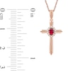 Oval Ruby and 0.04 CT. T.W. Diamond Frame Layered Cross Pendant in 10K Rose Gold