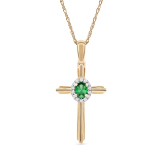 Oval Emerald and 0.04 CT. T.W. Diamond Frame Layered Cross Pendant in 10K Gold