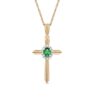 Oval Emerald and 0.04 CT. T.W. Diamond Frame Layered Cross Pendant in 10K Gold