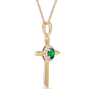 Oval Emerald and 0.04 CT. T.W. Diamond Frame Layered Cross Pendant in 10K Gold