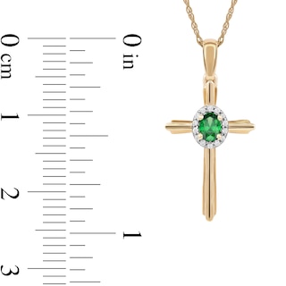 Oval Emerald and 0.04 CT. T.W. Diamond Frame Layered Cross Pendant in 10K Gold