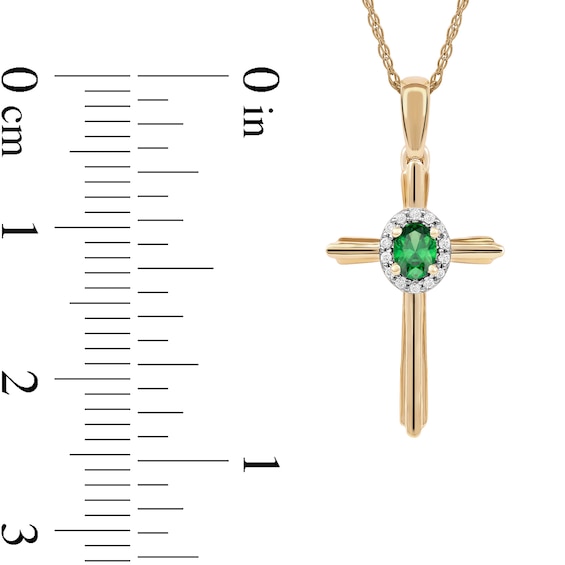 Oval Emerald and 0.04 CT. T.W. Diamond Frame Layered Cross Pendant in 10K Gold